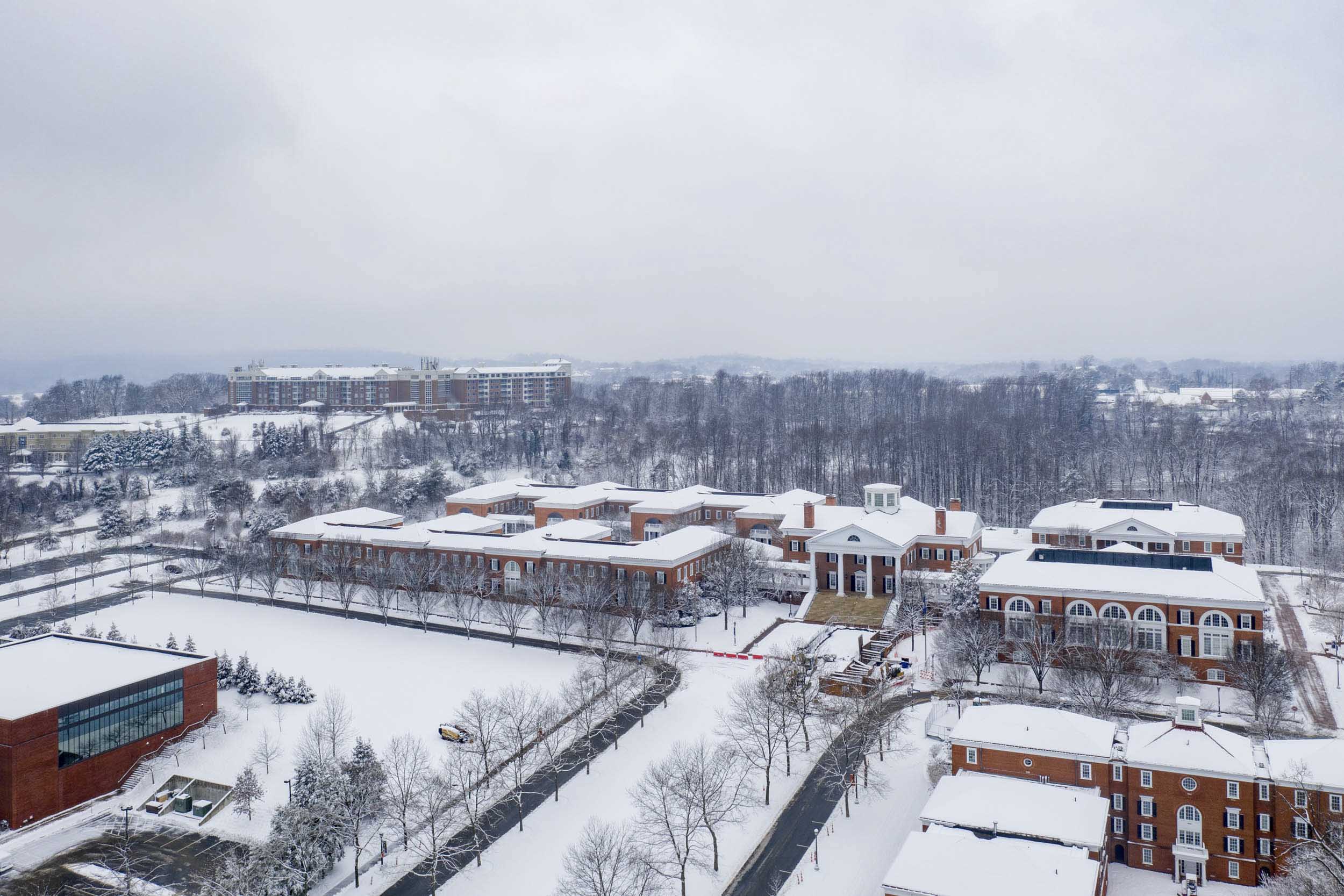 Arial View of UVA buildings covered in snow