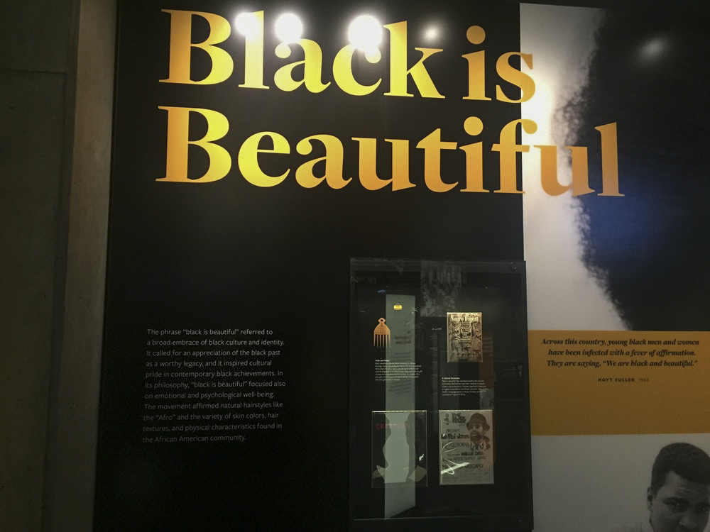 Exhibit sign that says Black is Beautiful 