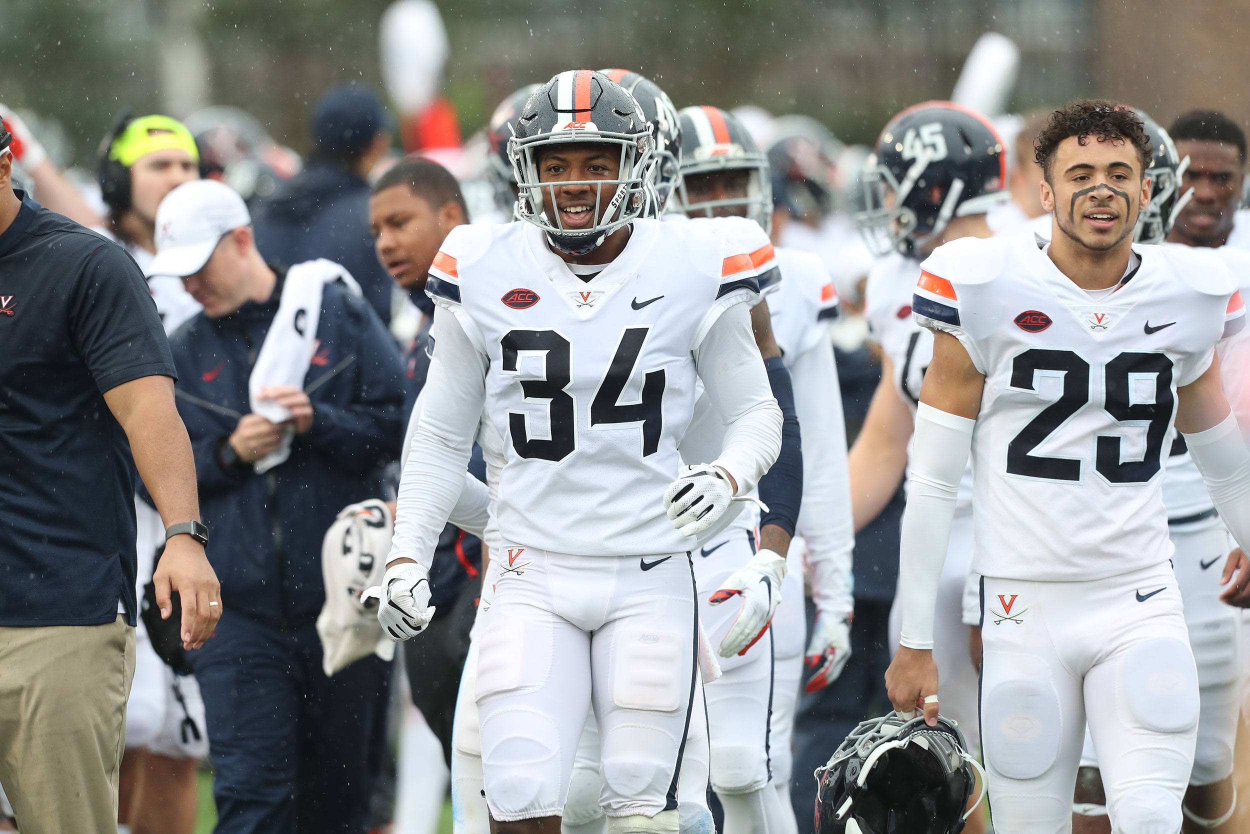 Cornerback Bryce Hall walking onto the field