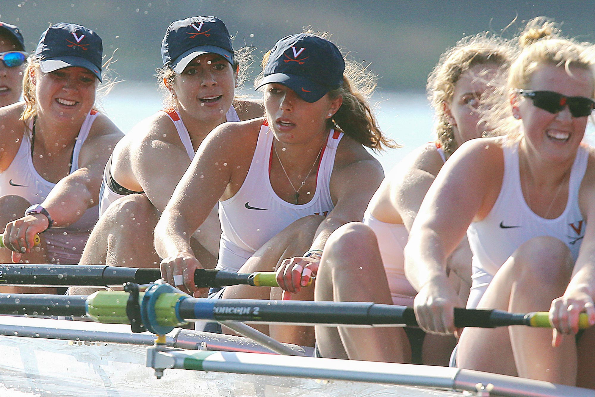 UVA Rowers rowing in the water
