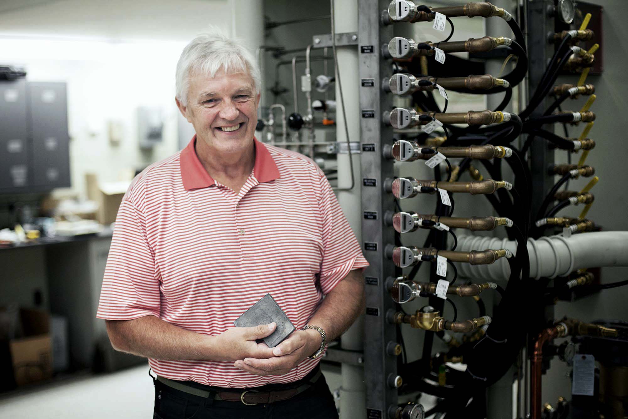 Haydn Wadley standing in an engineering lab