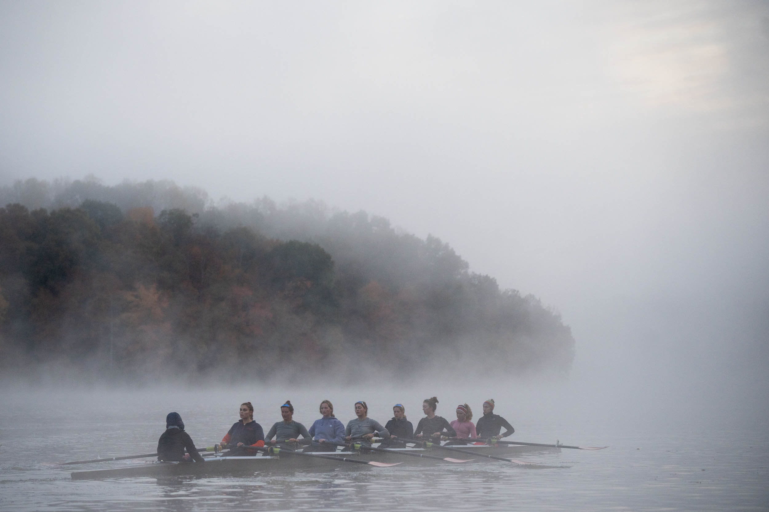 UVA womens rowing team on a foggy river