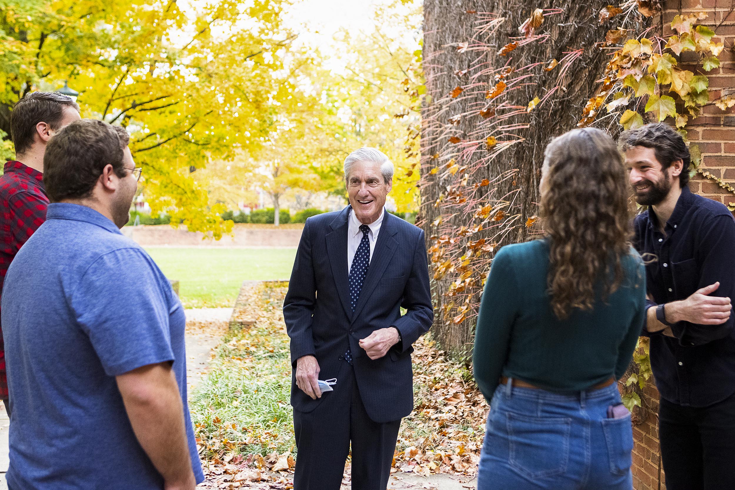 Robert Mueller speaking to a small group of students outside