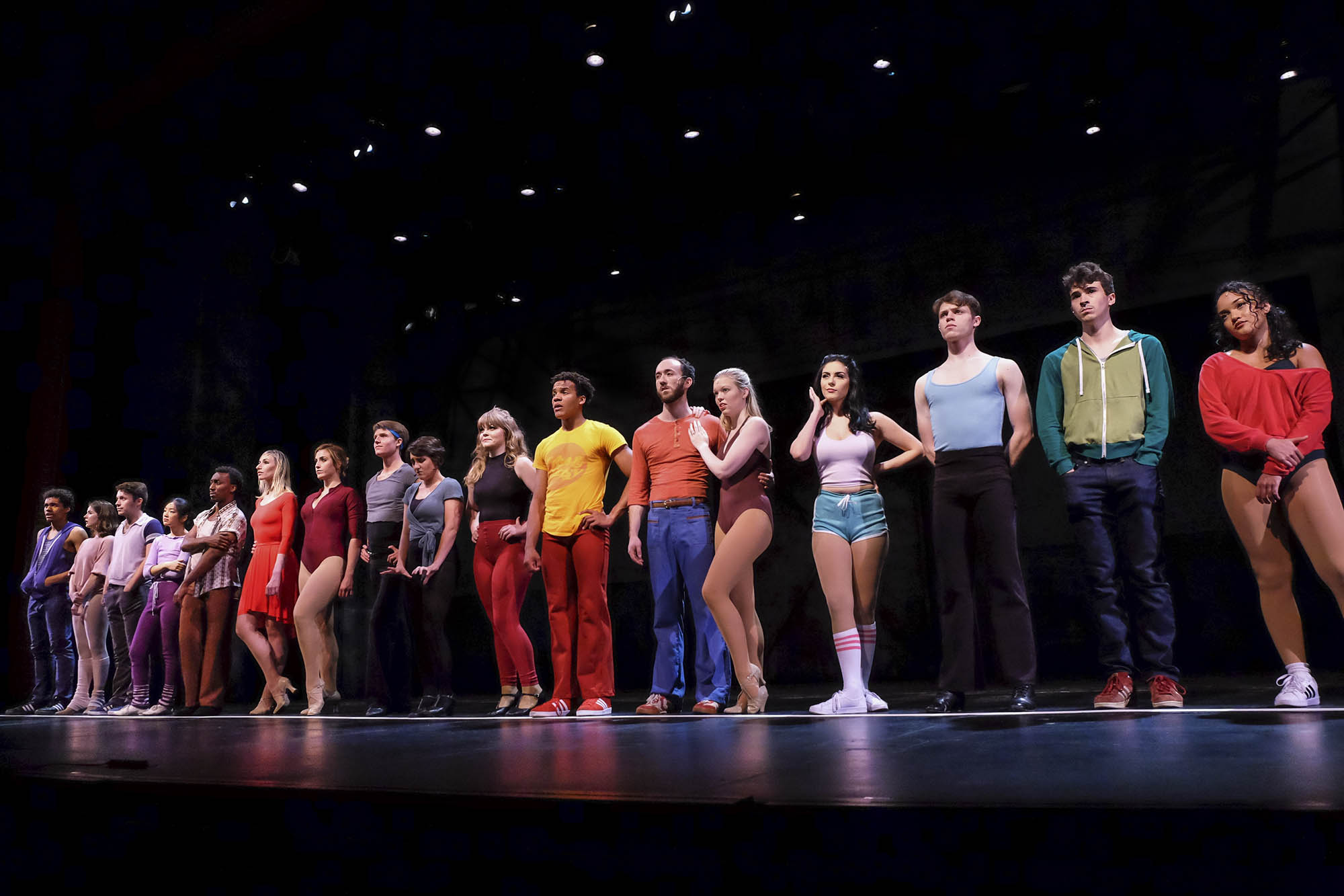 Group of UVA students, Broadway professionals, and Industry professionals standing in a line performing A Chorus Line