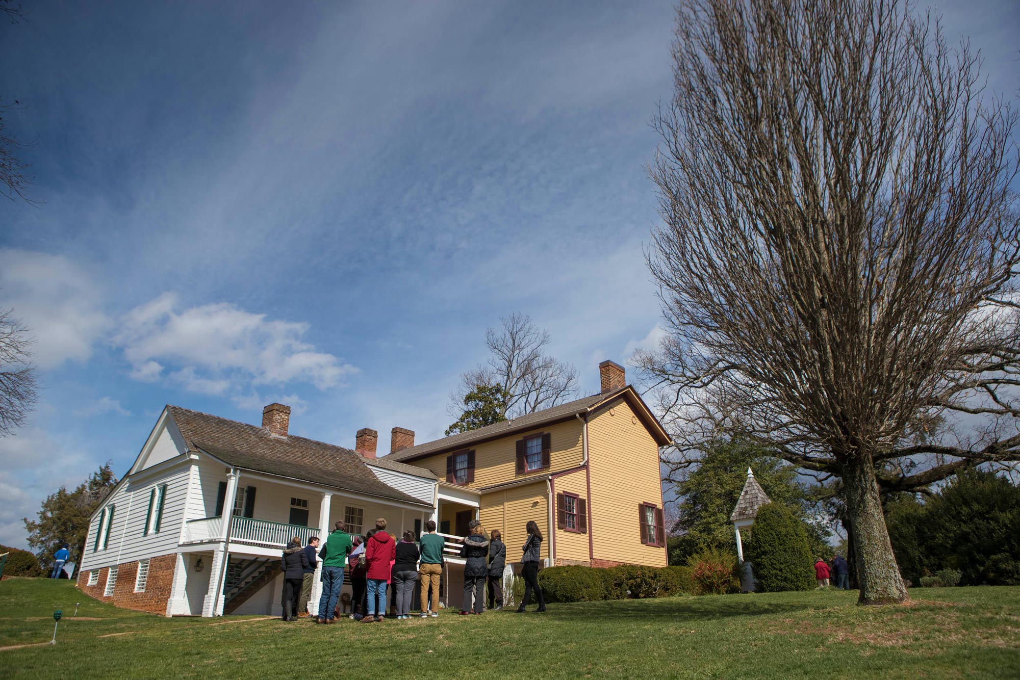 Above, the white house behind the students is now believed to have been Monroe’s guest house. Remains of his original home have been discovered in front of the adjoining building, called the Massey House. 