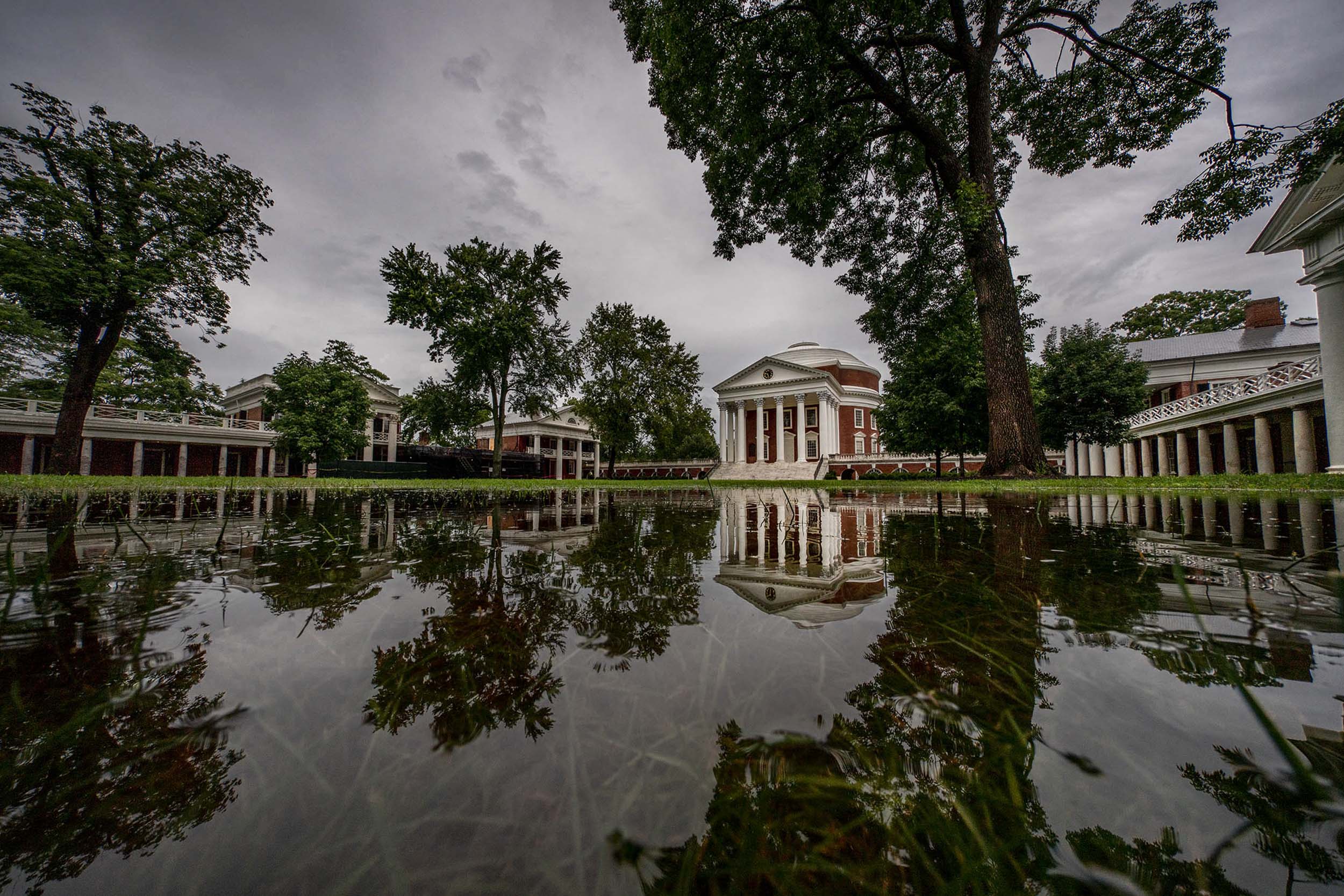The flooded Lawn reflecting the trees and Rotunda on the water