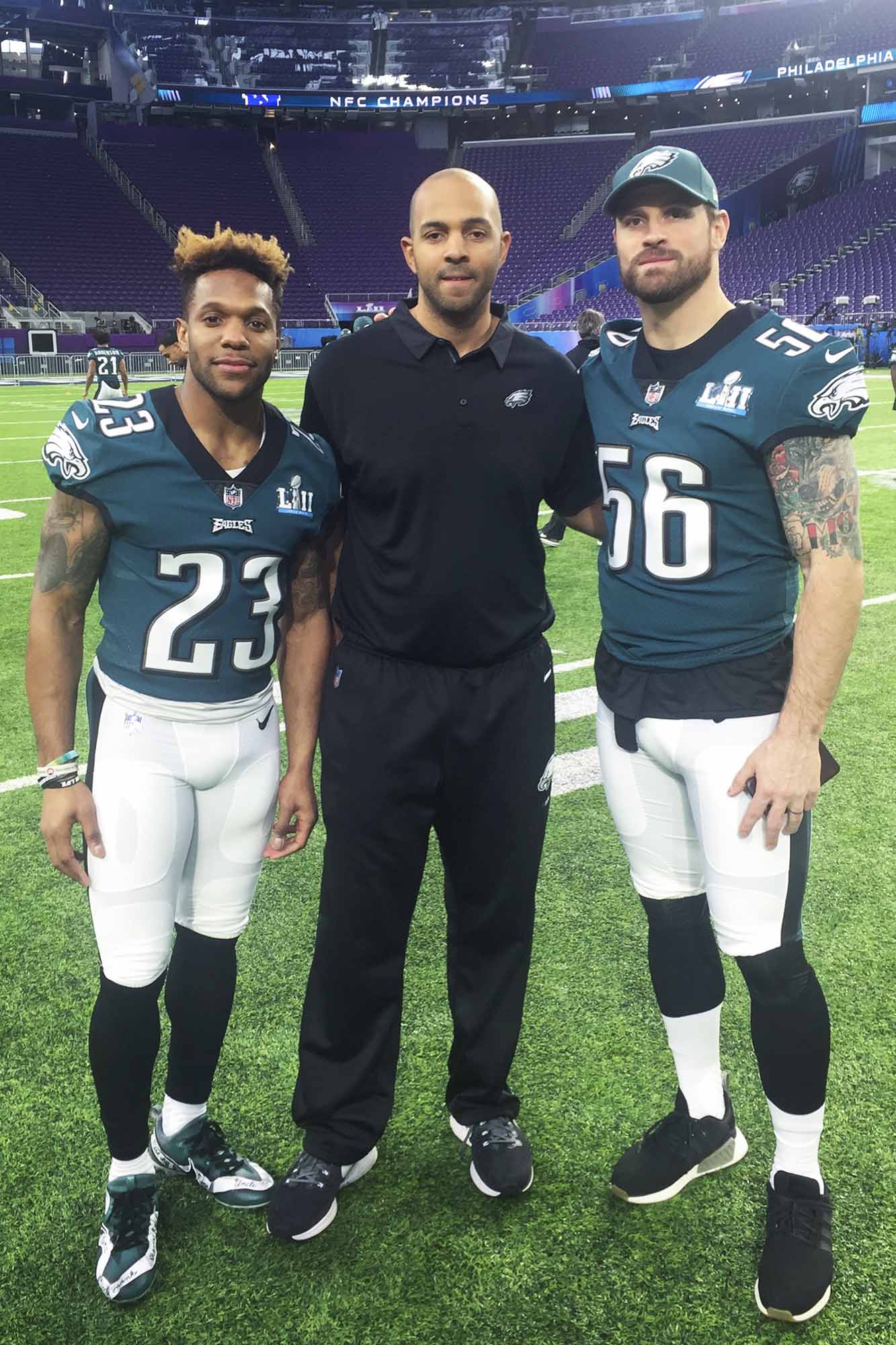 Eagles' Cunningham works with UVA players Rodney McLeod and Chris Long