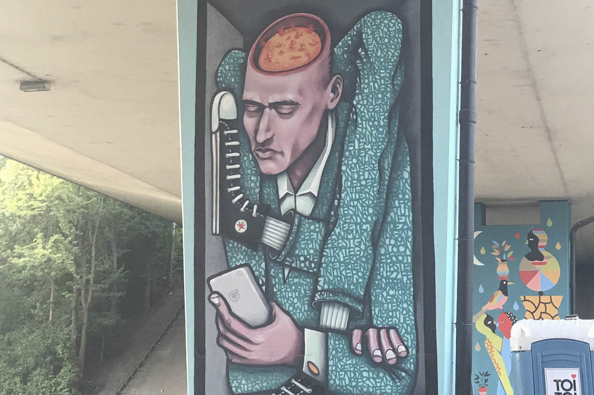 Modern artwork of a man looking at phone with his legs over his shoulders and his arms crossed