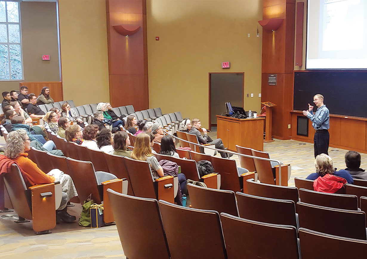 Christopher Krentz teaching a classroom of students