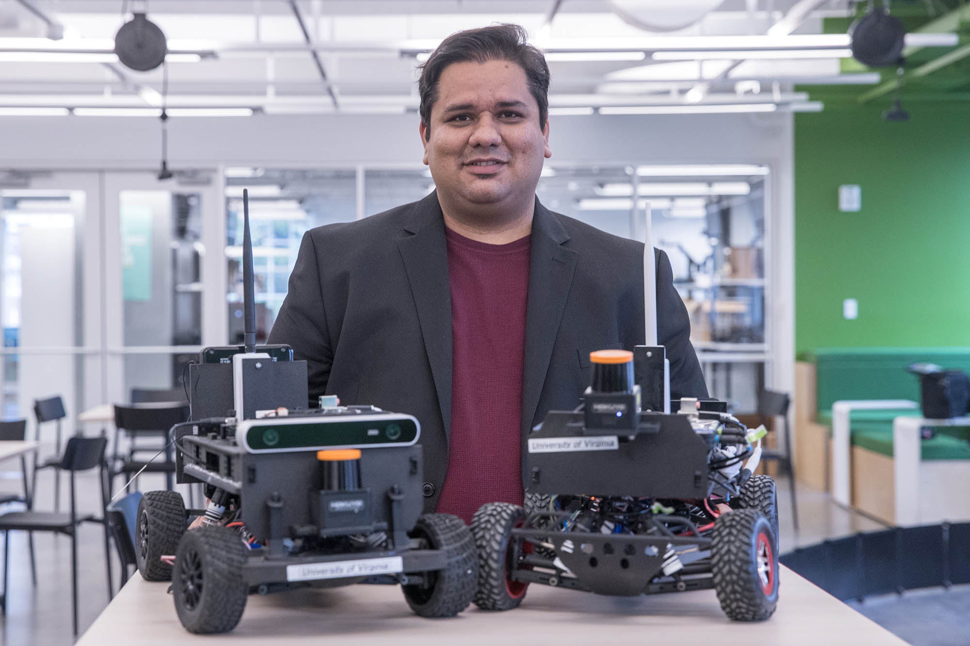 Mandhur Behl standing with his to Autonomous Vehichles