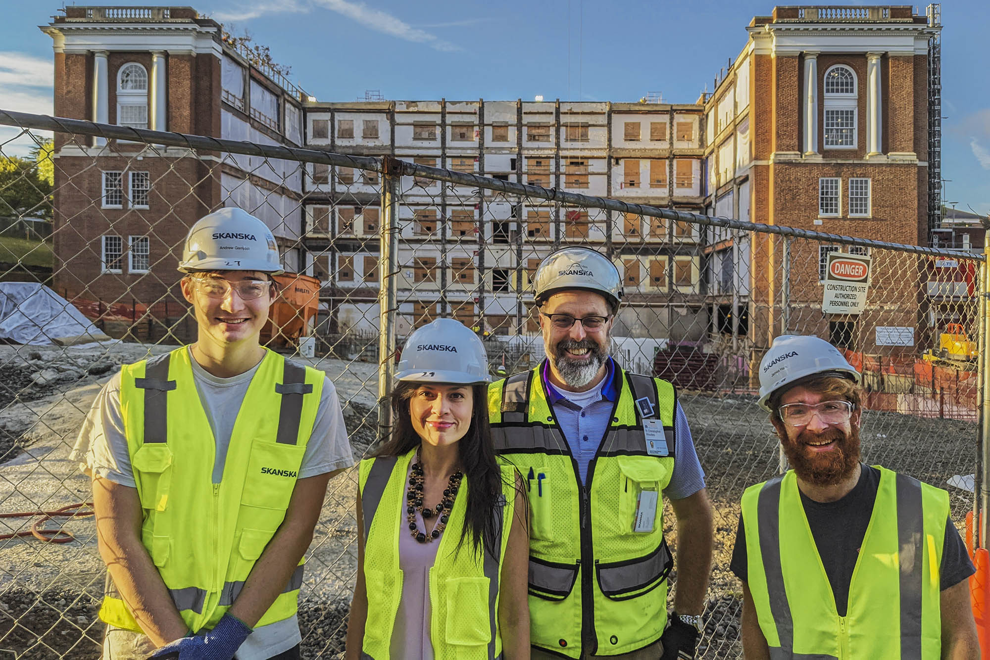 From left to rightAndrew Garnjost, Diana Duran, Chris Rhodes, James Hark standing outside of the Alderman Library construction