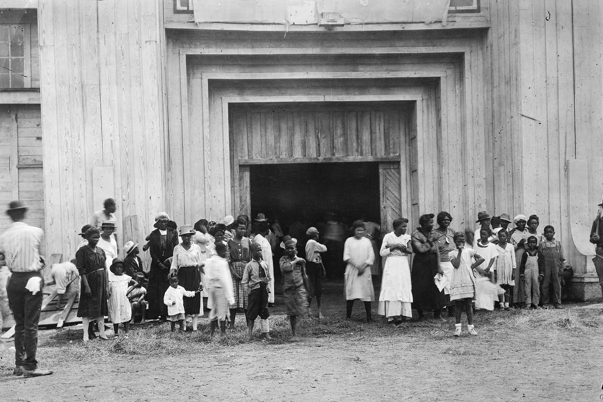 Black and white photo of a Refugee camp at the Tulsa Oklahoma fairgrounds