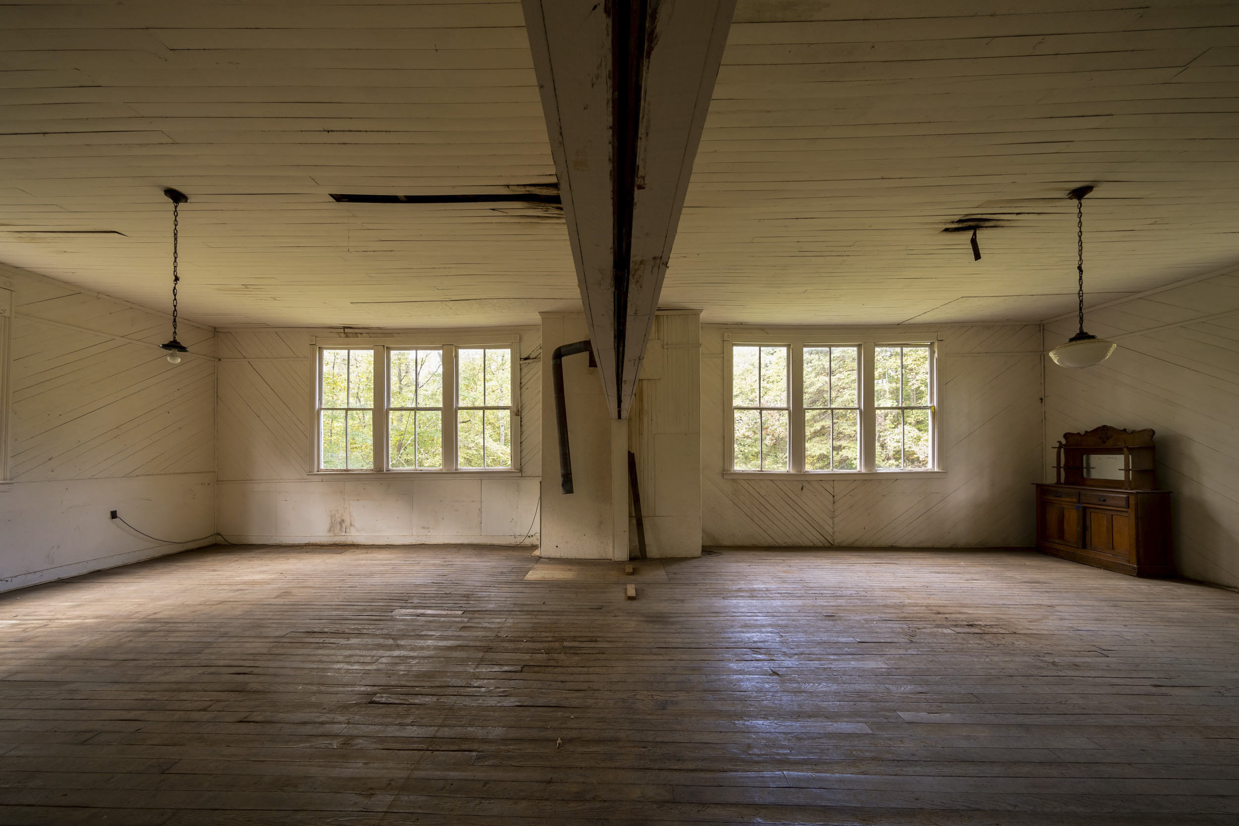 Inside view of the worn down Pine Grove School room