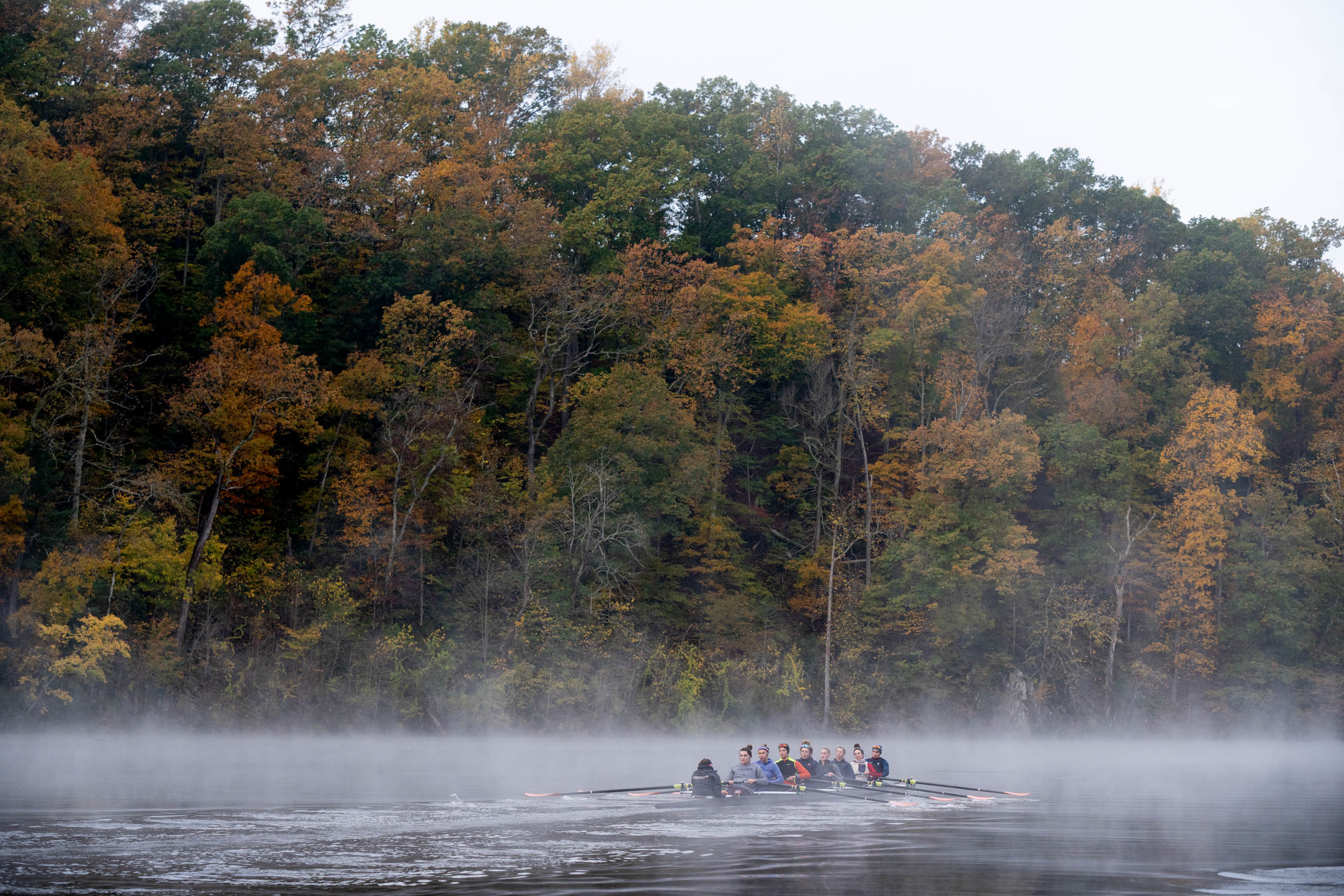 UVA womens rowing team on a foggy river
