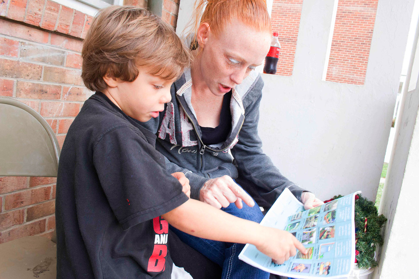 Lisa Zampini and her son consider different garden designs for their home in Westhaven. (Photo courtesy of Shantell Bingham.)