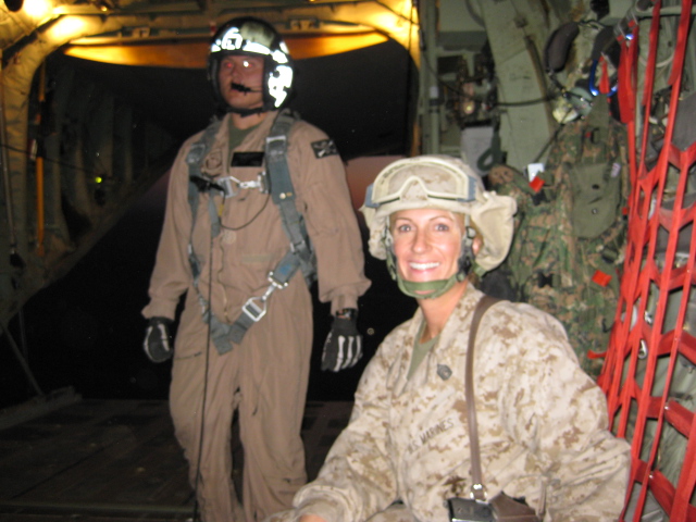 Kim Johnson, right, on aircraft while being deployed to Al-Asad Air Base, Iraq 