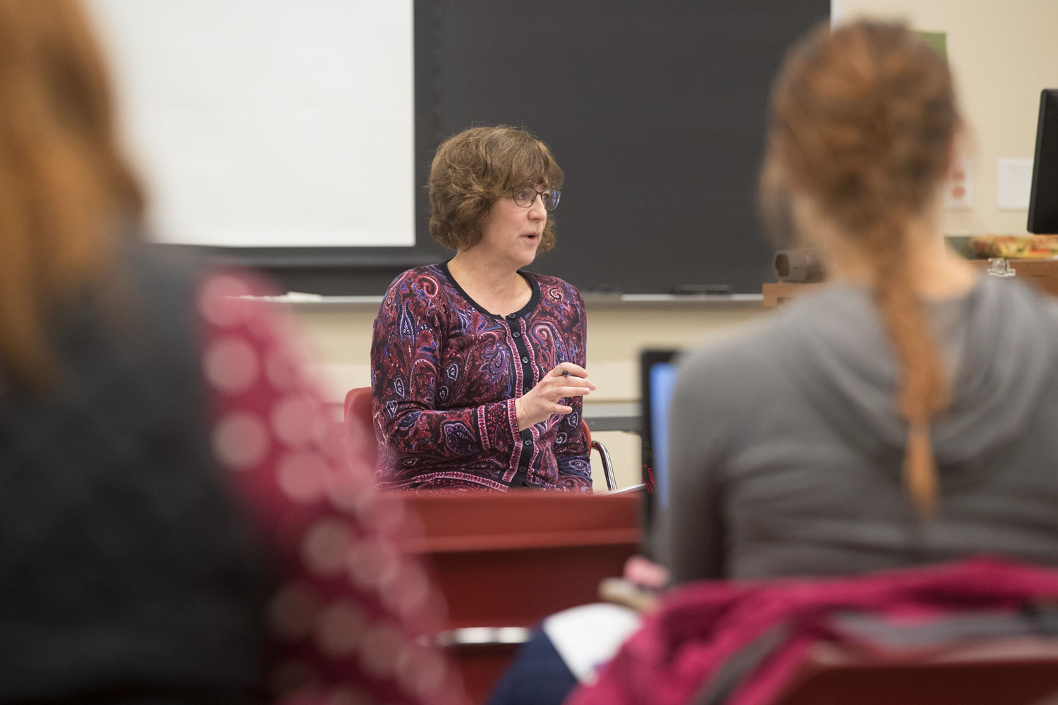 Kerry Bolger teaching in front of class