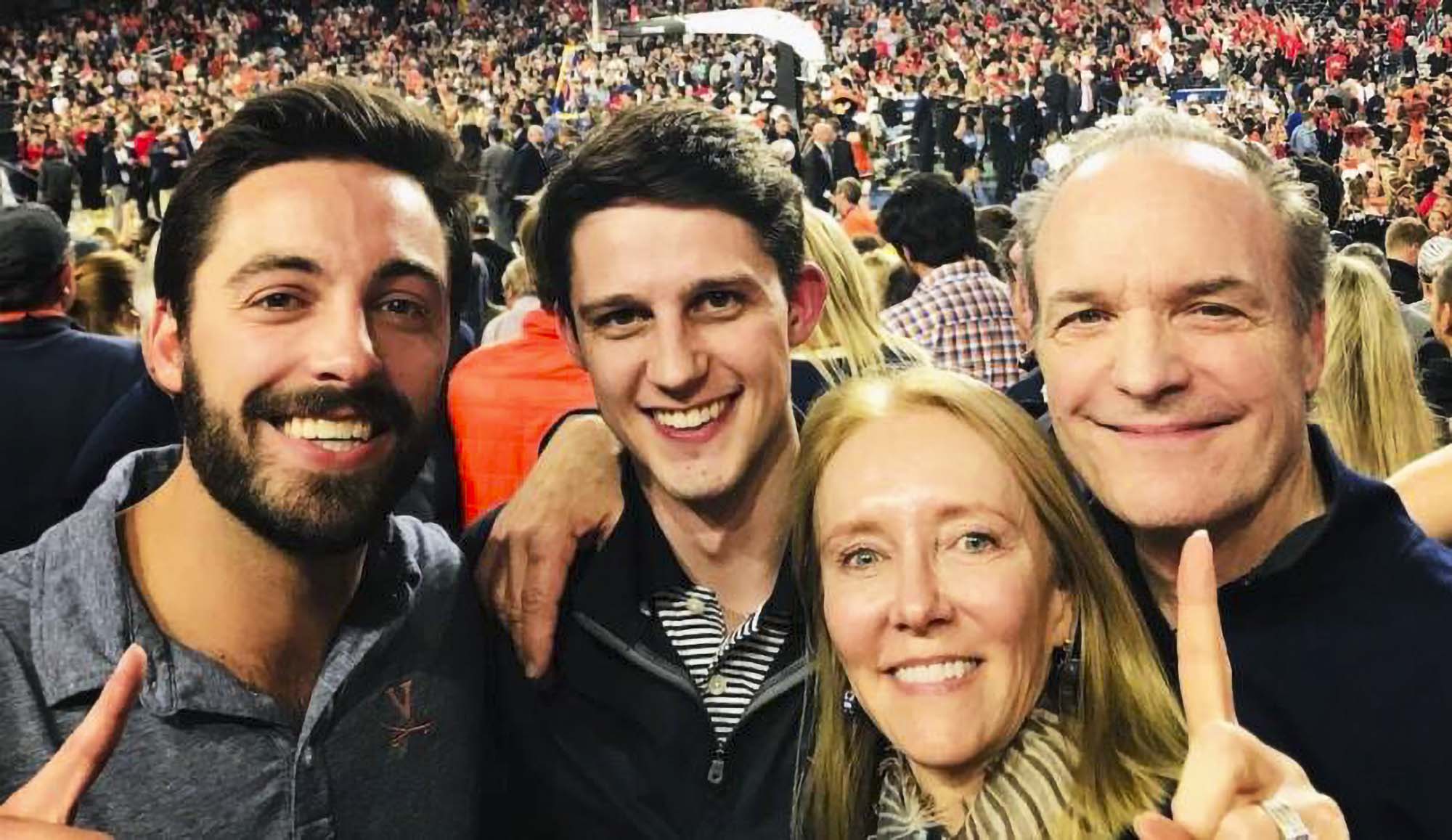 Alumna Jane-Ashley Skinner with her family at a ball game