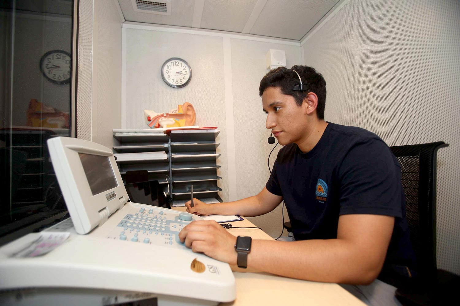 Jesus Gomez working on a lab machine