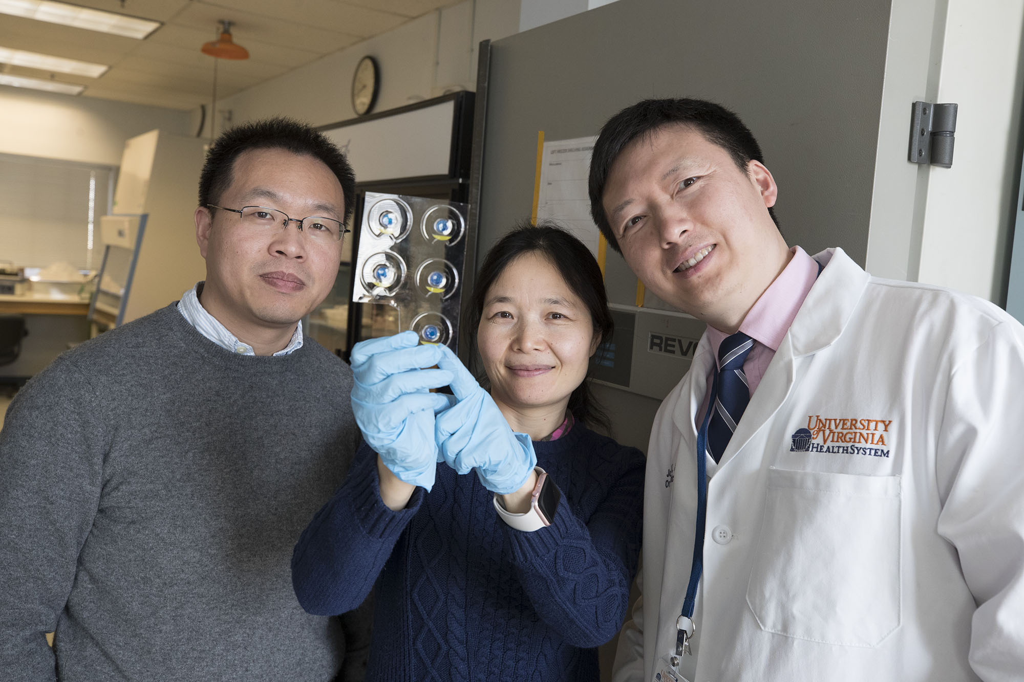 Jin Li, Josh li, and Baoxing Xu stand together for a picture