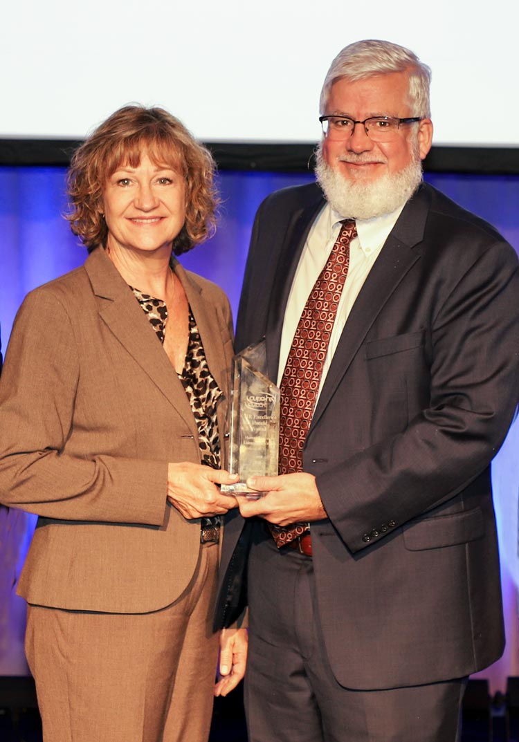  Kelley Stuck and Sean Jackson hold the national award together