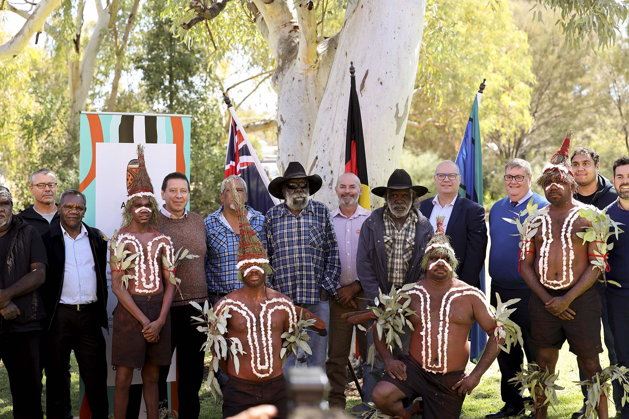 Group photo with people dressed in authentic Aboriginal dress