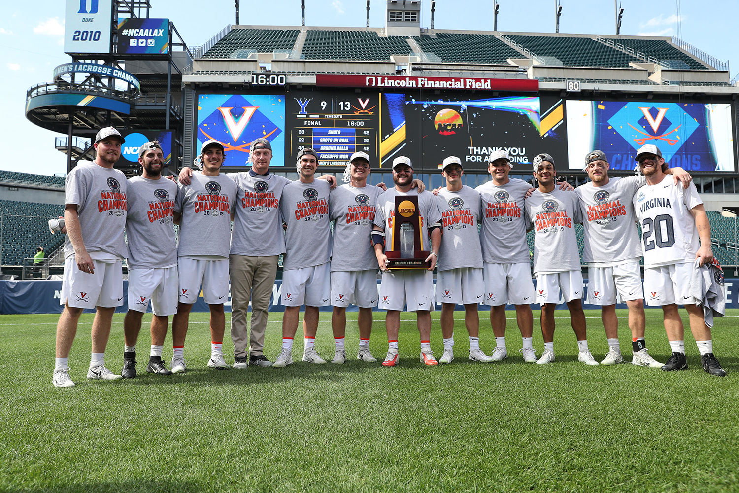 Lacrosse Team holding NCAA trophy on Lincoln Financial Field
