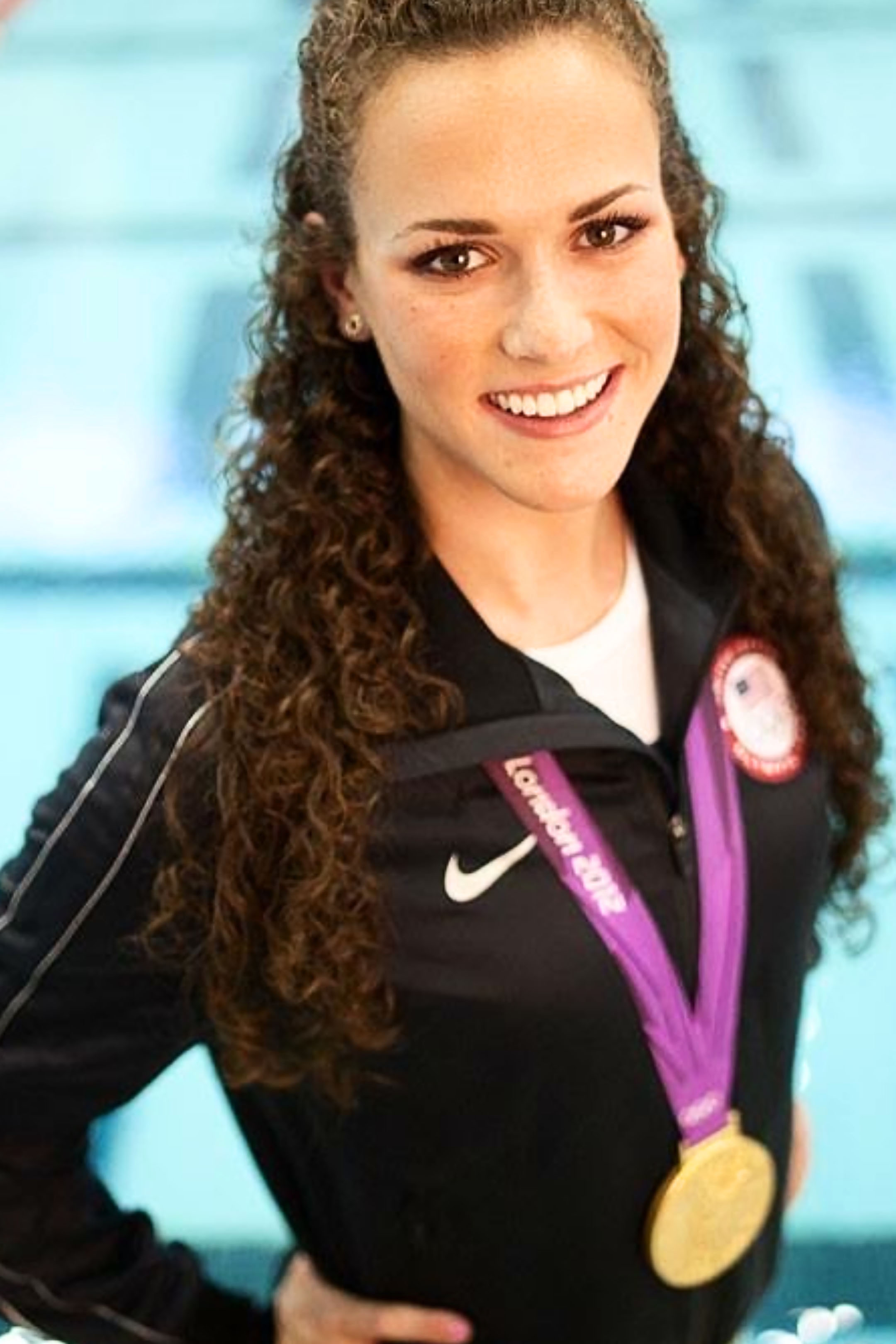 Lauren Perdue Headshot with London Olympic Medal