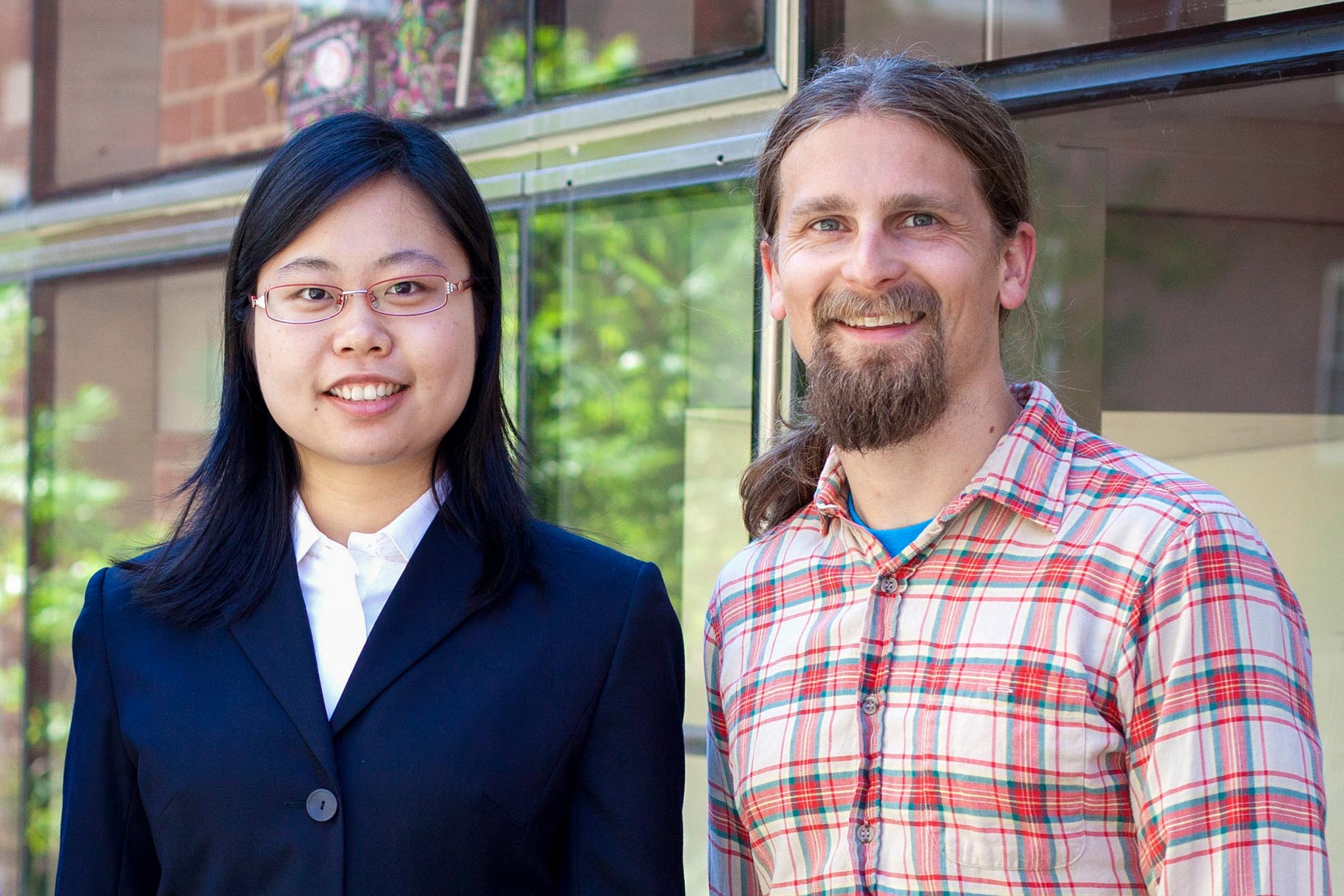 Lin Bai and Jon Bellona stand together