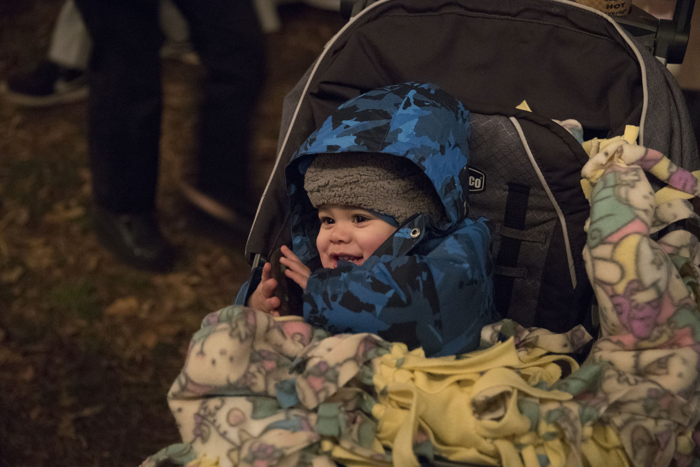 Fourteen-month-old Lucas Reinhard bundled up in their stroller