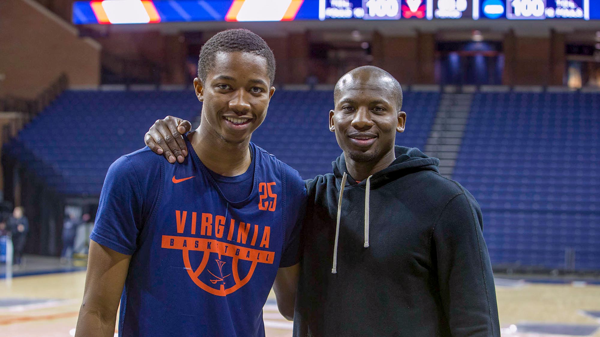 Diakite, left, and Diane smile together for a camera