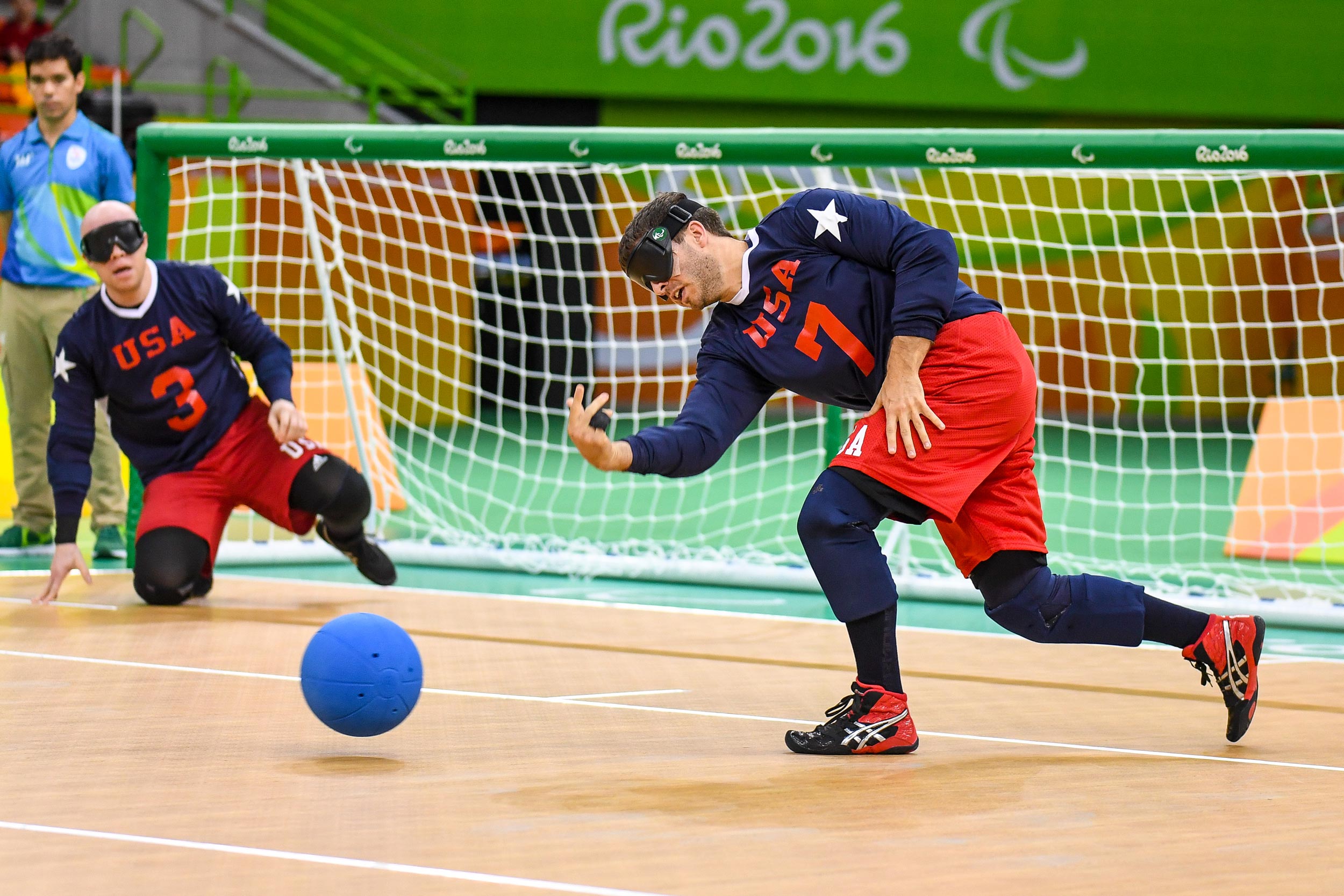 Matt Simpson rolling the goalball back into play during the 2016 Olympic games