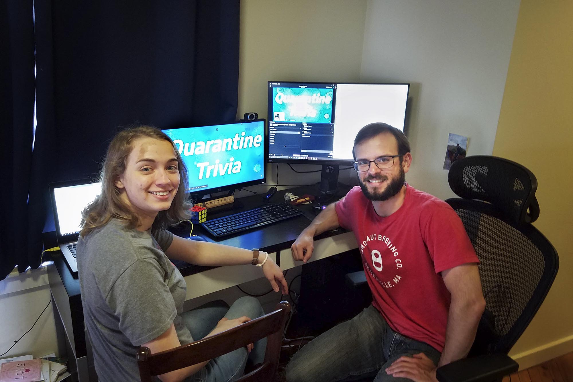 Jeffrey White,left, and Julia Preziosi, right, working on the computer to create Quarantine Trivia