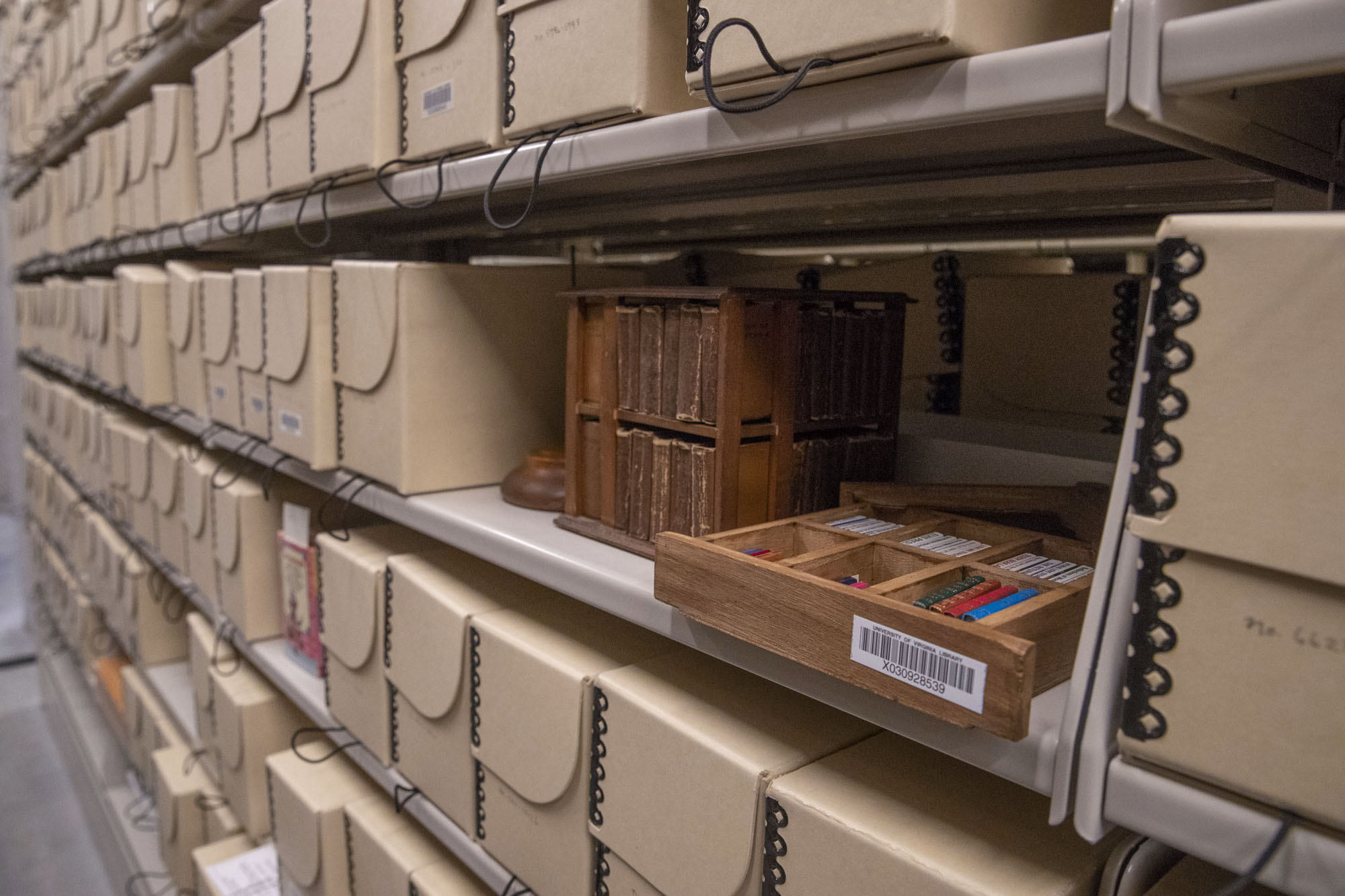 The 15,000 volumes of the McGehee Miniature Book Collection are stored in microfilm boxes and occupy just two sides of compact shelves in the rare book archives.