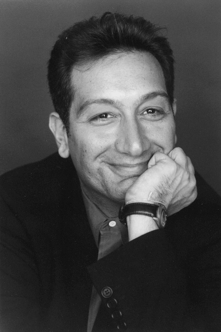 Moisés Kaufman headshot, black and white