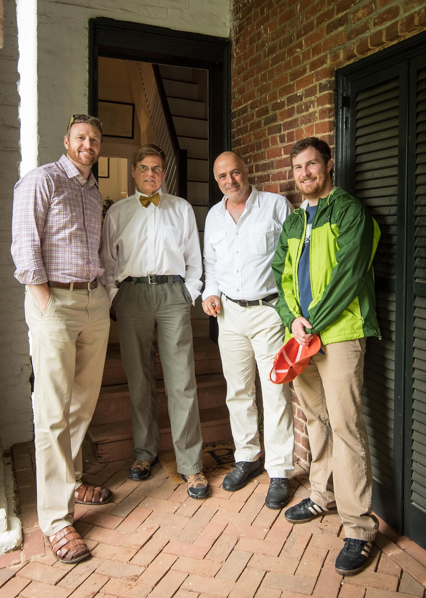 Director of Studies Stephen Plaskon, second from left, and Montes-Bradley, third from left, invited U.Va. Associate Professor of Architectural History Louis Nelson, left, and graduate assistant Kyle Edwards, right, to tour the small building.