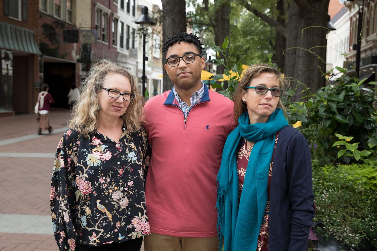 Nancy Deutsch, Bonnie Gordon, and Daniel Fairley, center, stand together for a picture