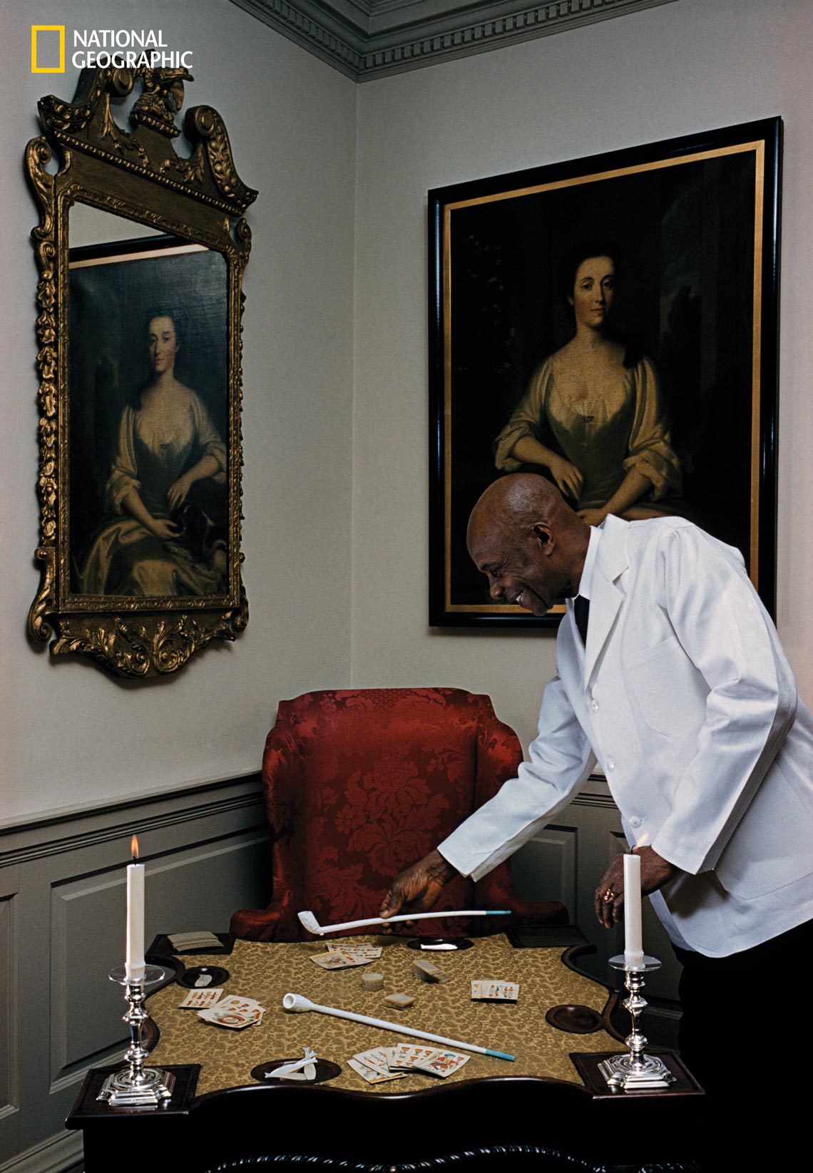 Man setting a long pipe on a table