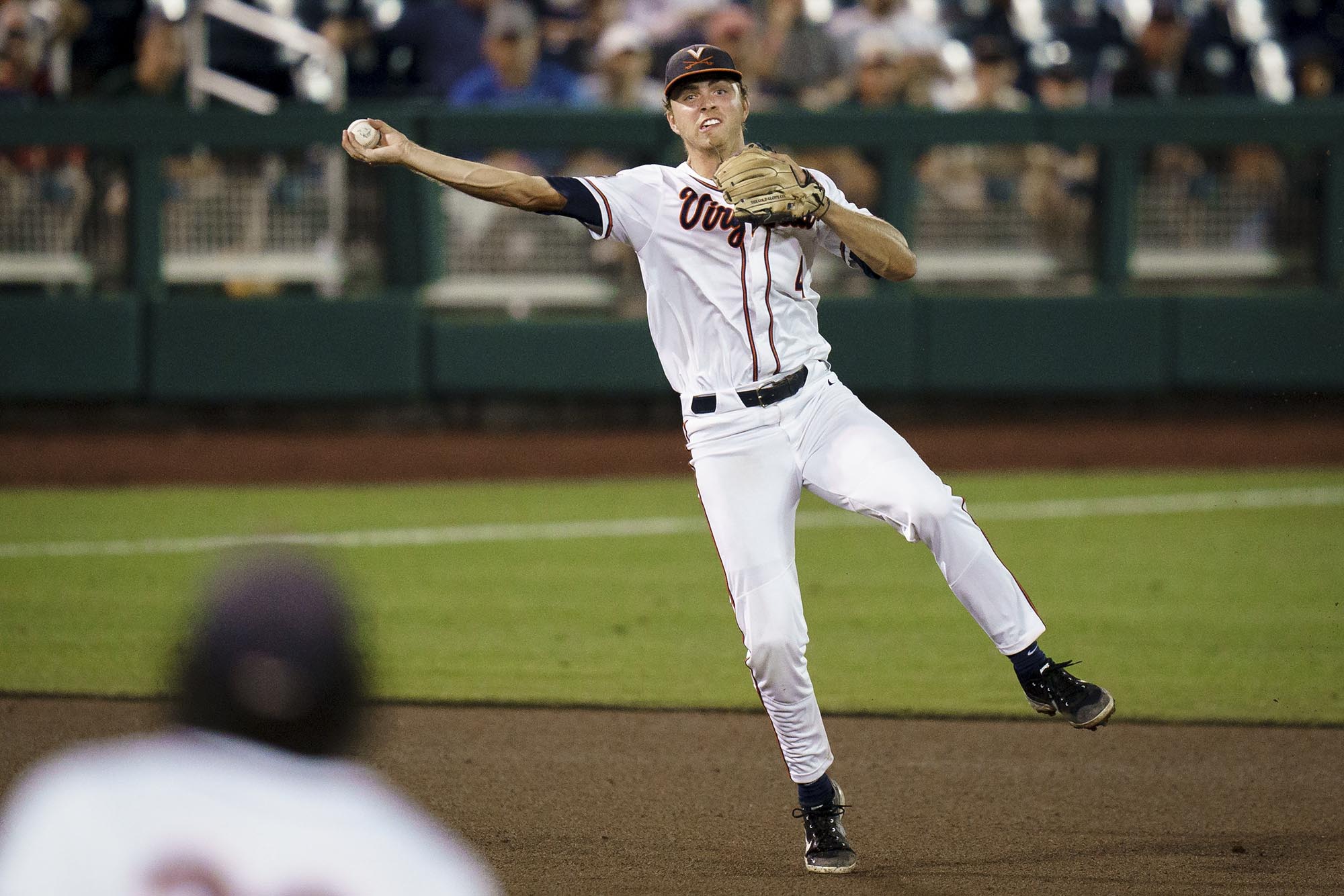 Nic Kent throwing a ball to infield