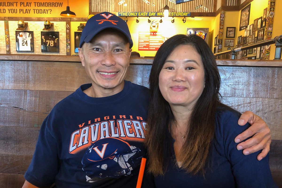 Patasomcit and his wife, Bong, pose together for a picture