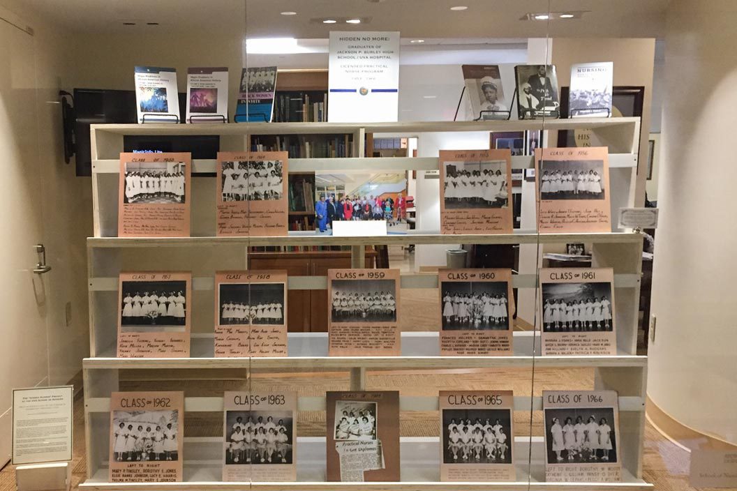 A display case displays pictures of every LPN glass