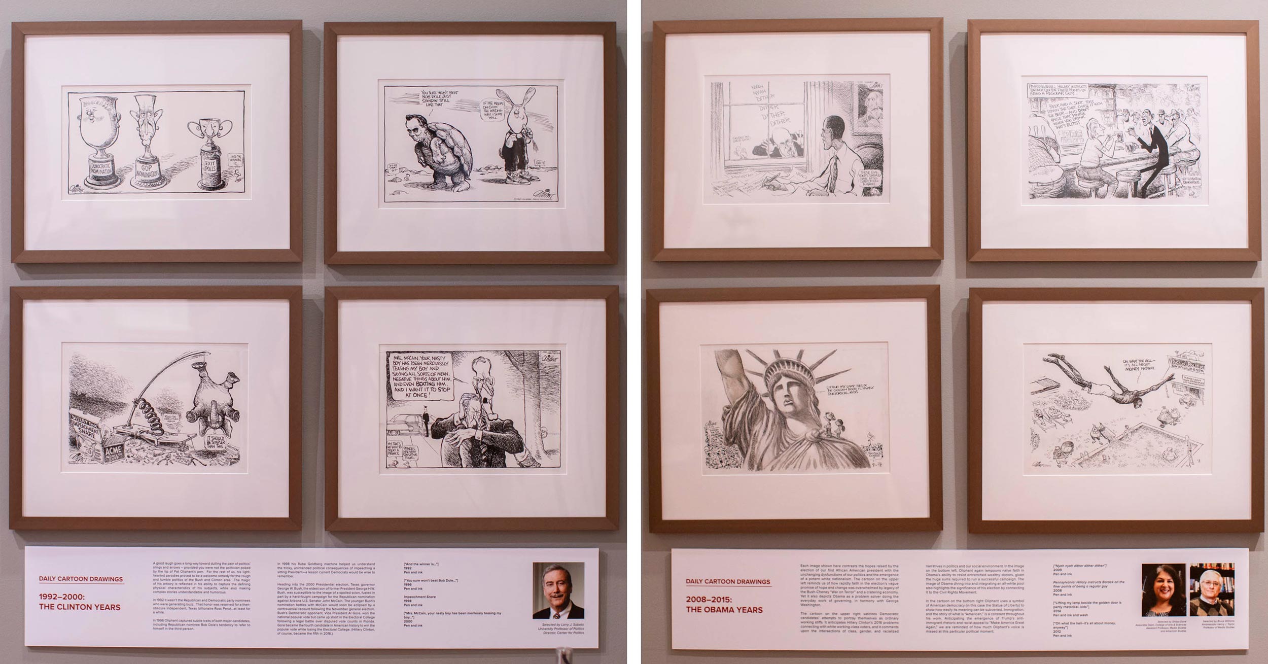 Political cartoons in picture frames hung on a wall