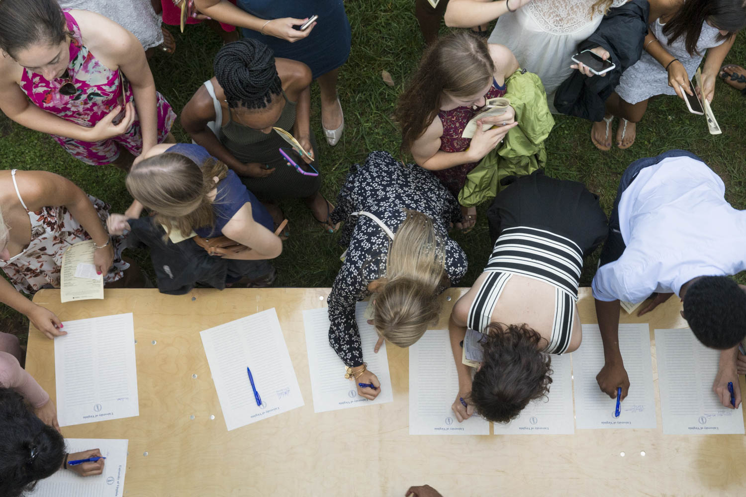 Aerial view of students signing the honor code 