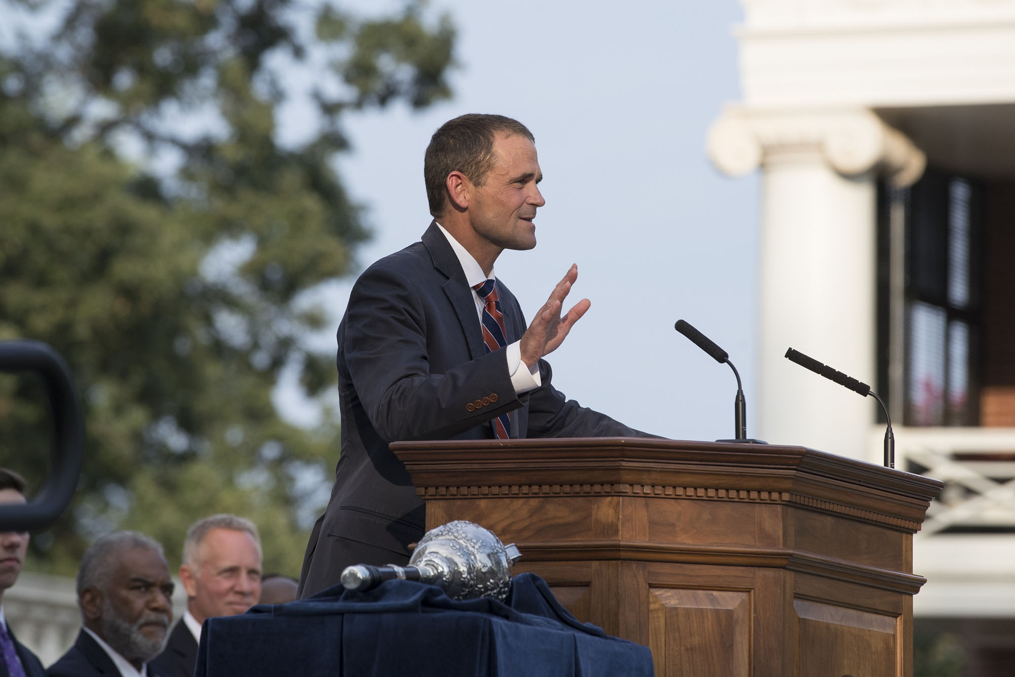 President Jim Ryan standing at a podium giving a speech