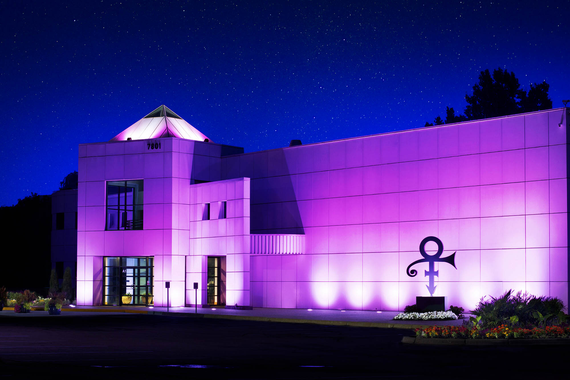 Building in Paisely Park illuminated with purple lights
