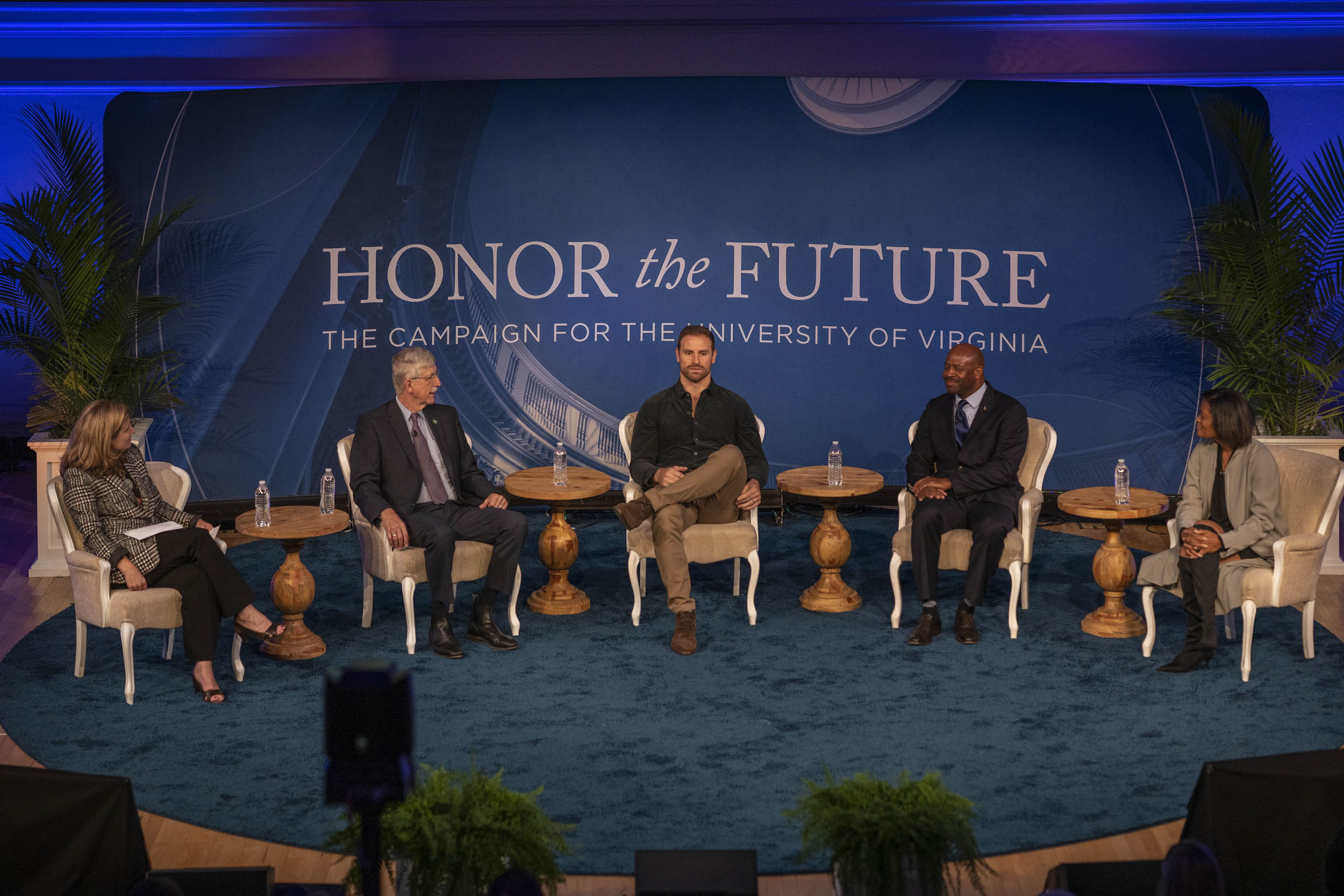 Panelists sit on the stage for the Honor the Future panel discussion