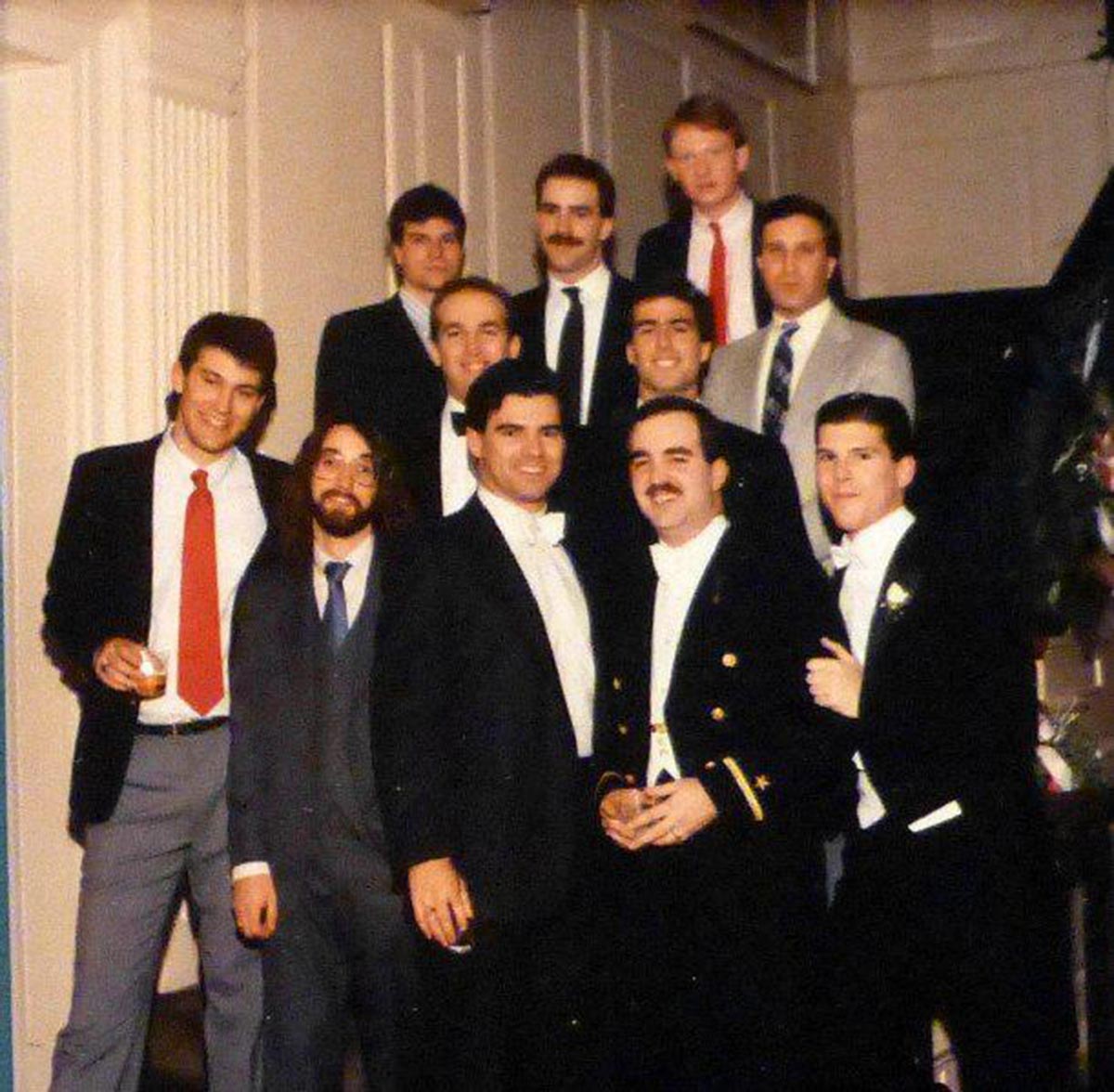 Patrick Murphy, front row right, with other guys on a set of steps for a picture