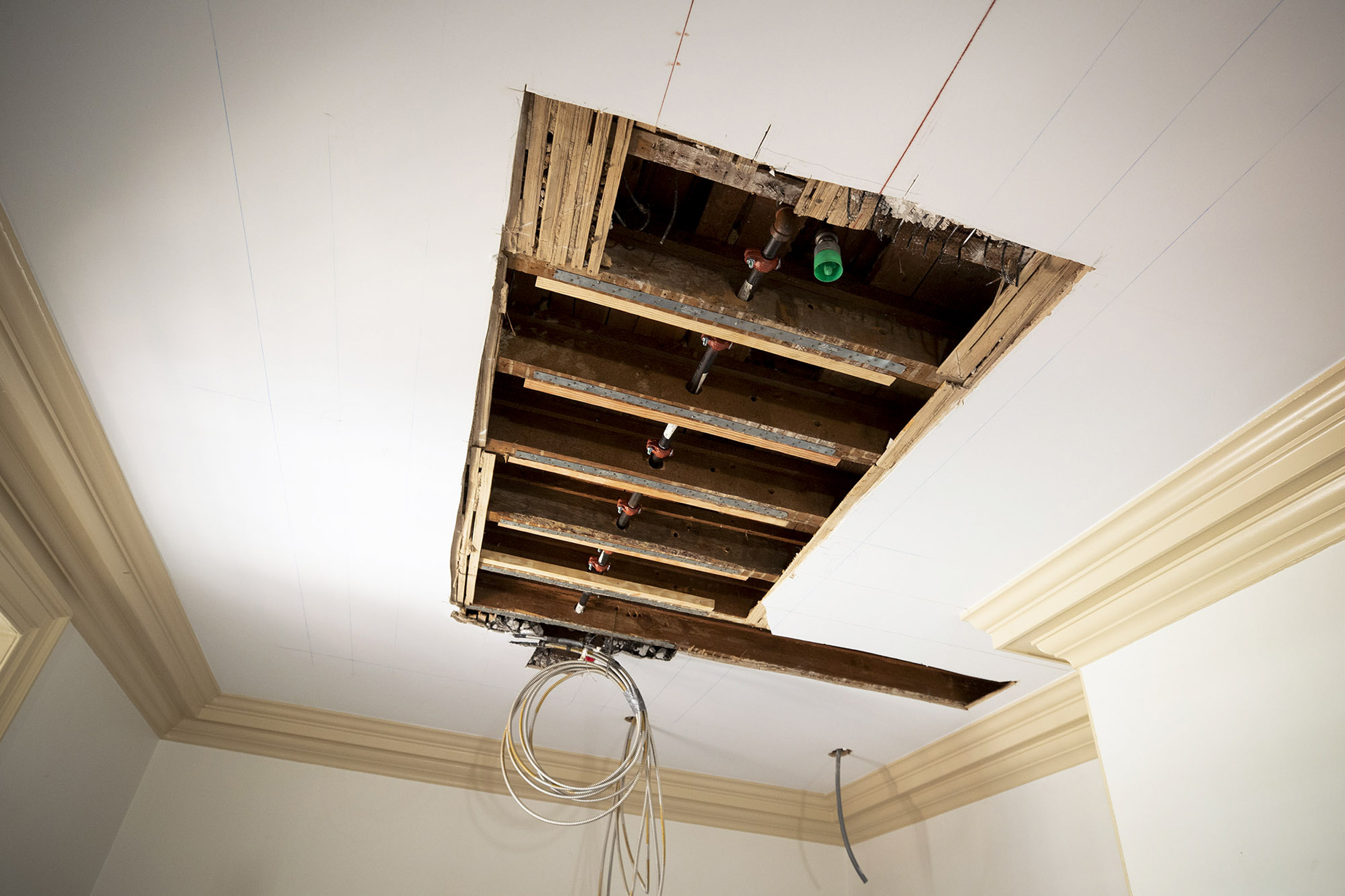 Whole in the ceiling to expose the water sprinkler system