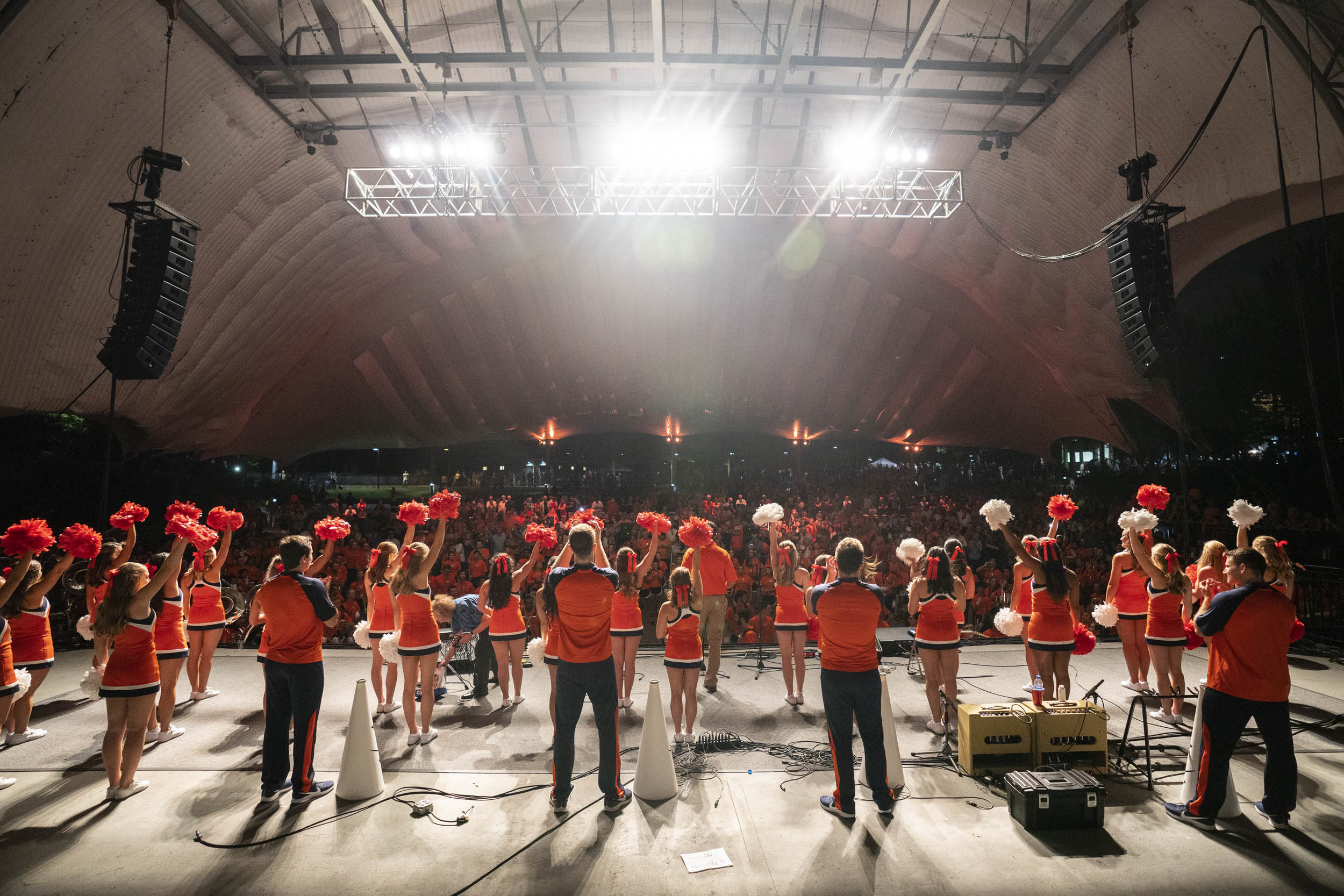 UVA Cheerleaders cheering on the pavilion stage