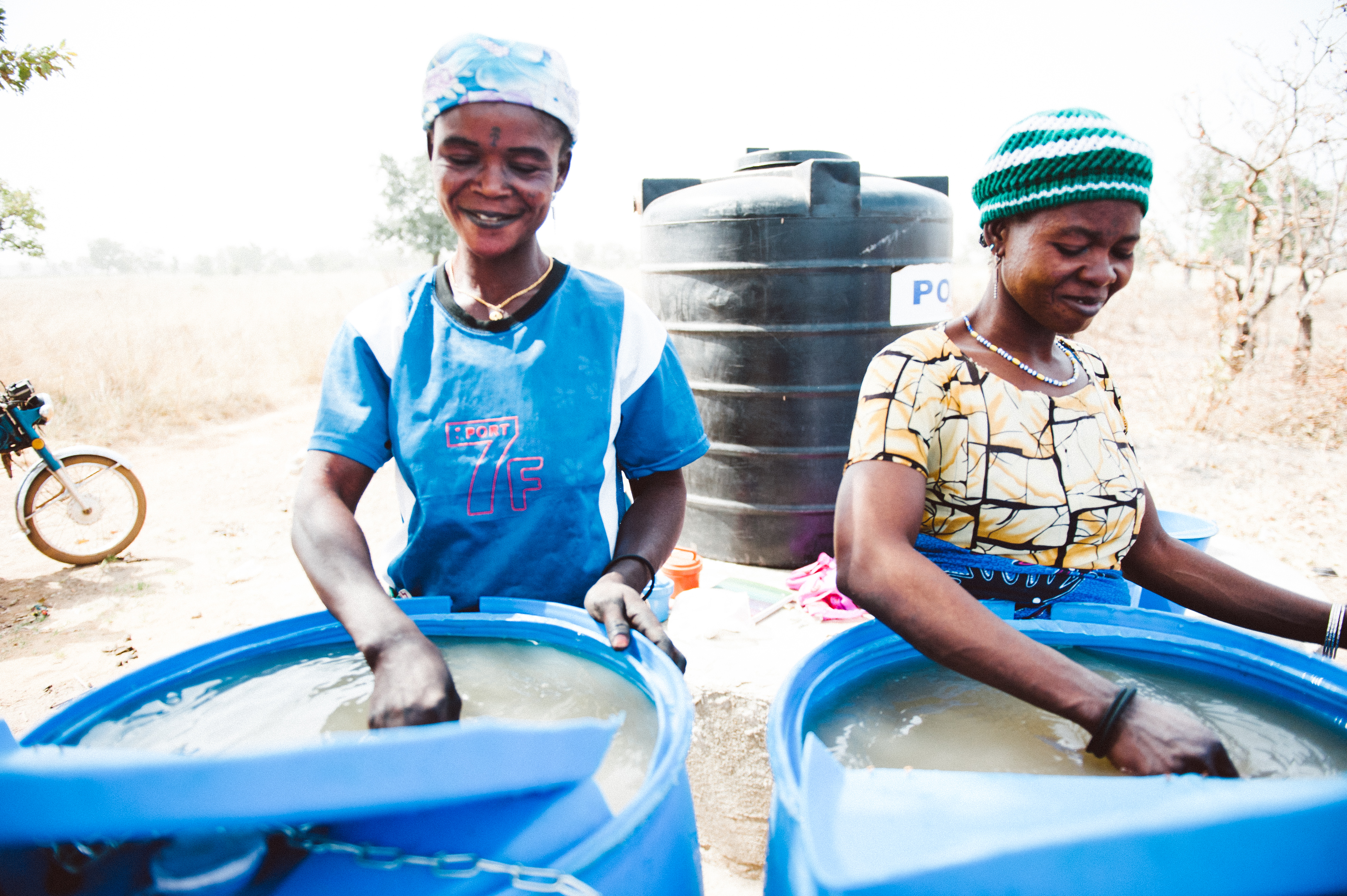 Clean water entrepreneurs add the coagulate alum and wait for floating particles to clump together, making them easy to remove from the water before chlorine is added.